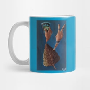 Hands out of Leaf Mug